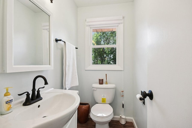 1745 Lyndale Rd, Aurora, IL 60506 - bathroom featuring a sink and wood finished floors