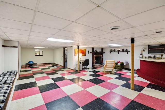 1745 Lyndale Rd, Aurora, IL 60506 - finished basement featuring tile patterned floors, a fireplace, a drop ceiling, and bar