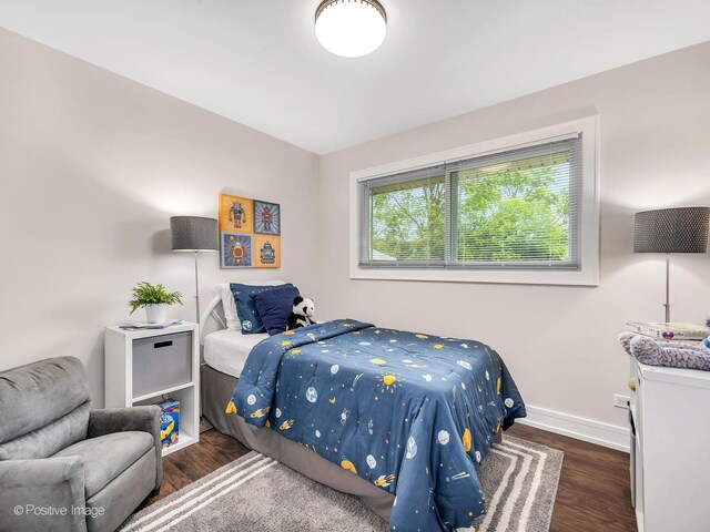 18731 John Ave, Country Club Hills, IL 60478 - bedroom with baseboards and wood finished floors