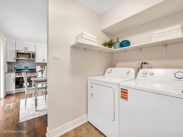 18731 John Ave, Country Club Hills, IL 60478 - washroom featuring independent washer and dryer and light wood finished floors