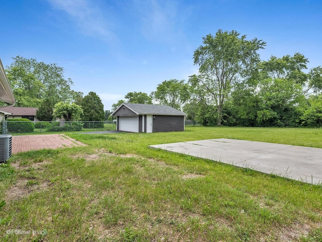 18731 John Ave, Country Club Hills, IL 60478 - view of yard with a detached garage and an outdoor structure