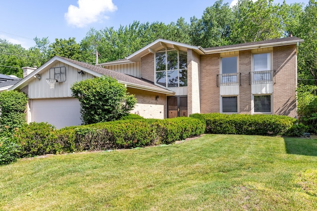 3528 Riverside Dr, Wilmette, IL 60091 - view of front of house with brick siding, a front lawn, and an attached garage
