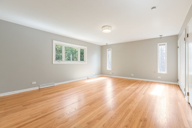 3528 Riverside Dr, Wilmette, IL 60091 - spare room featuring plenty of natural light, light wood-style floors, and a smoke detector