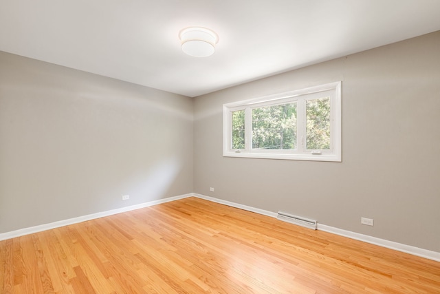3528 Riverside Dr, Wilmette, IL 60091 - empty room with light wood finished floors and baseboards