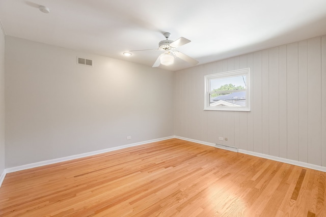 3528 Riverside Dr, Wilmette, IL 60091 - empty room with light wood-style floors and a ceiling fan