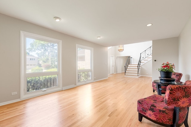 3528 Riverside Dr, Wilmette, IL 60091 - living area with healthy amount of natural light, light wood-type flooring, stairs, and recessed lighting