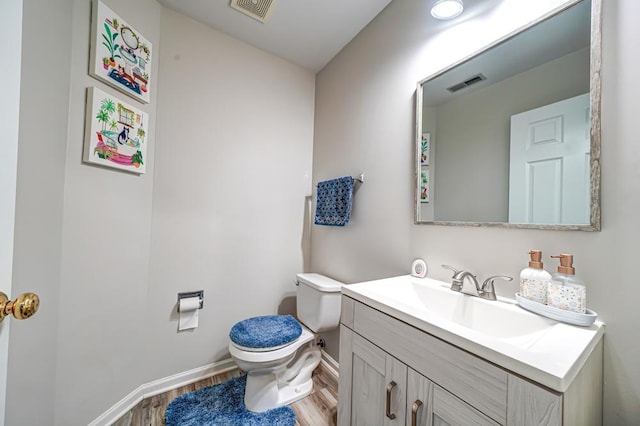1471 Doolittle Ln, Grayslake, IL 60030 - half bathroom with wood finished floors and vanity