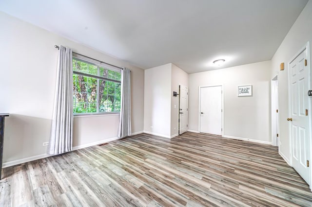 1471 Doolittle Ln, Grayslake, IL 60030 - foyer featuring wood finished floors and baseboards