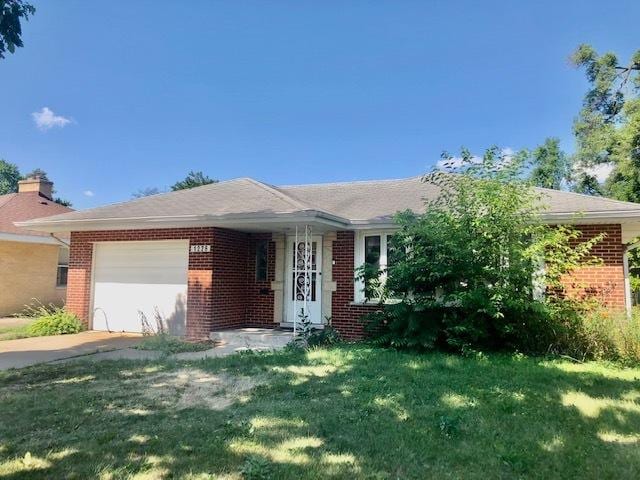 1226 Potter Rd, Park Ridge, IL 60068 - view of front of home with brick siding, an attached garage, a front yard, and driveway