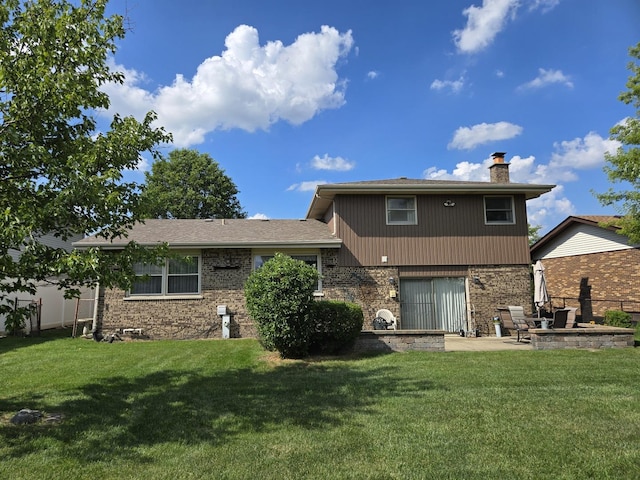 6305 157th St, Oak Forest, IL 60452 - rear view of property with a chimney, a patio, and a fire pit