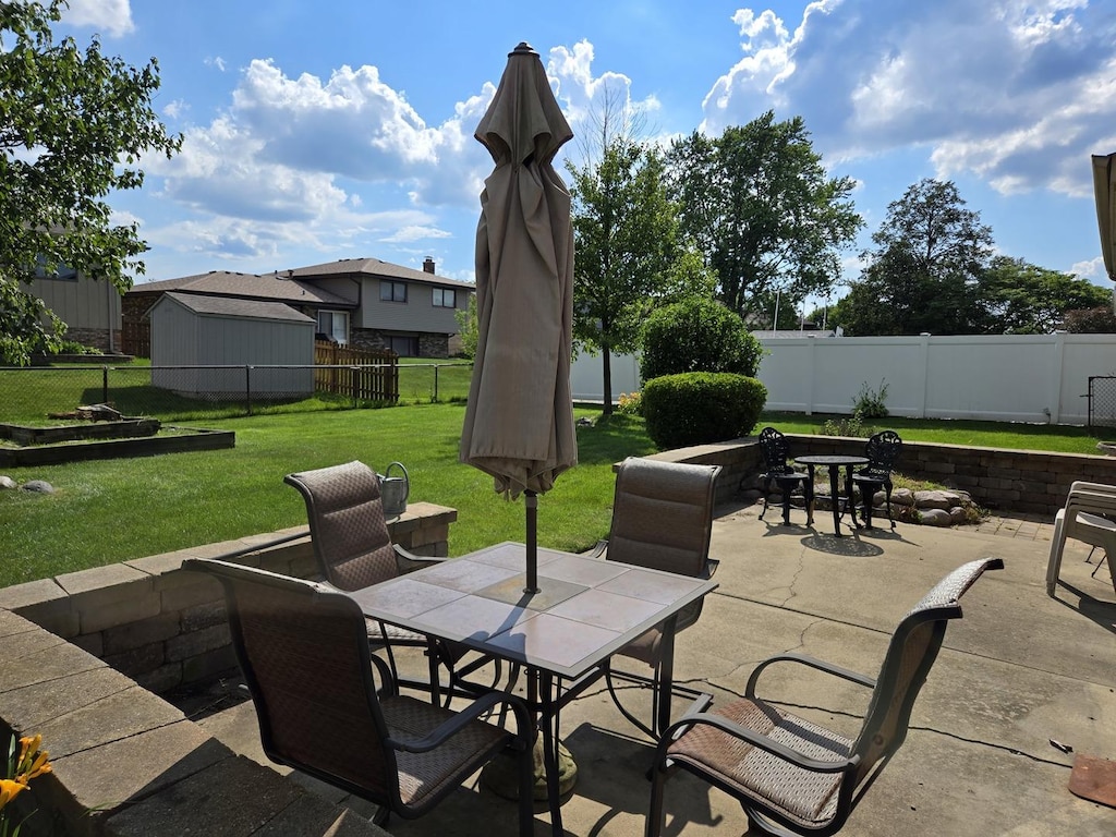 6305 157th St, Oak Forest, IL 60452 - fenced backyard featuring outdoor dining space and a patio