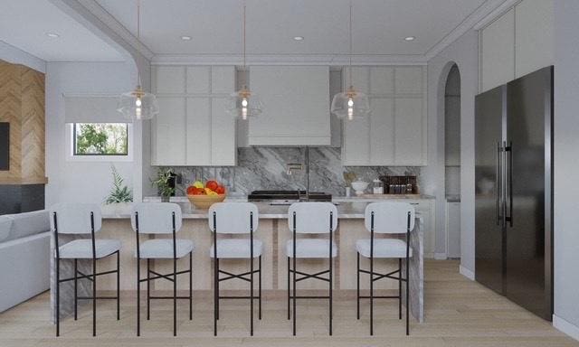 2203 W Huron Ave, Chicago, IL 60622 - kitchen featuring high quality fridge, white cabinetry, light wood-type flooring, tasteful backsplash, and crown molding