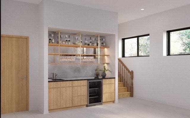 2203 W Huron Ave, Chicago, IL 60622 - indoor wet bar with wine cooler and stairway