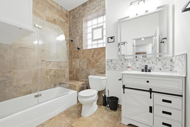 4105 S Drexel Blvd Unit 1N, Chicago, IL 60653 - full bathroom featuring vanity, washtub / shower combination, tile walls, and decorative backsplash