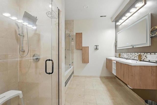 4105 S Drexel Blvd Unit 1N, Chicago, IL 60653 - bathroom with a shower stall, double vanity, and tasteful backsplash