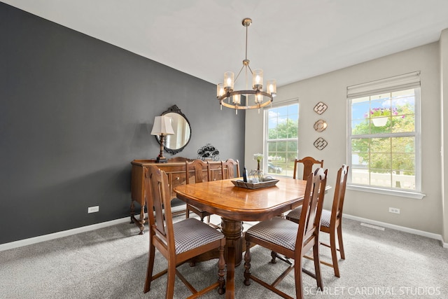 854 Preston Ln, Oswego, IL 60543 - dining area featuring a chandelier and carpet floors