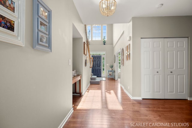 854 Preston Ln, Oswego, IL 60543 - foyer featuring a chandelier and hardwood / wood-style floors