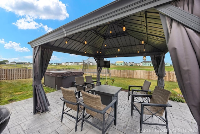 854 Preston Ln, Oswego, IL 60543 - fenced backyard featuring a gazebo, a hot tub, and a patio area