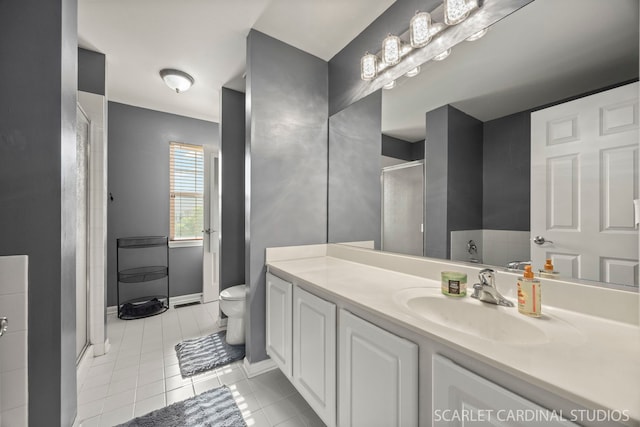 854 Preston Ln, Oswego, IL 60543 - bathroom with a shower stall, vanity, and tile patterned flooring