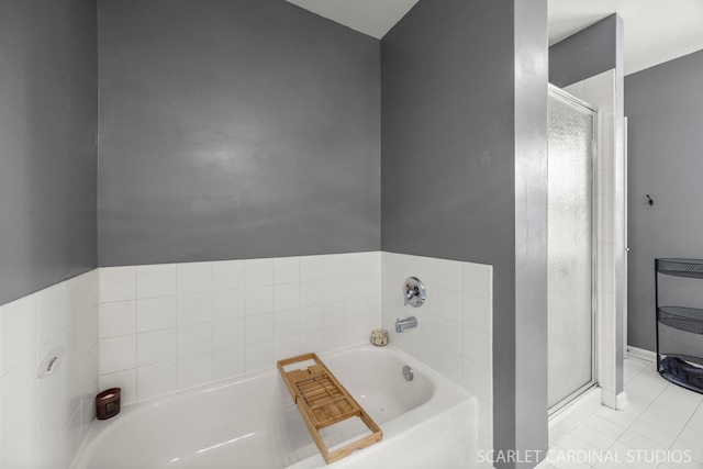854 Preston Ln, Oswego, IL 60543 - bathroom with a bath, a shower stall, and tile patterned floors