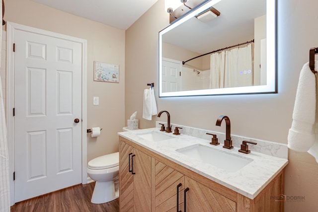 1186 Ballantrae Pl Unit D, Mundelein, IL 60060 - full bath with double vanity, wood finished floors, and a shower with shower curtain