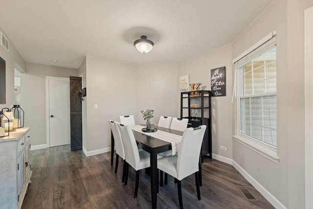 5462 Ridge Xing, Hanover Park, IL 60133 - dining area with dark wood-style flooring