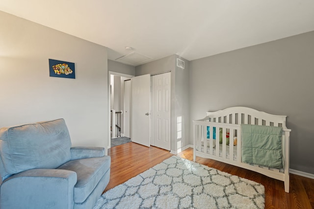 5462 Ridge Xing, Hanover Park, IL 60133 - bedroom with wood finished floors and a closet