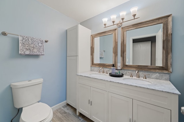 5462 Ridge Xing, Hanover Park, IL 60133 - bathroom featuring double vanity and wood finished floors