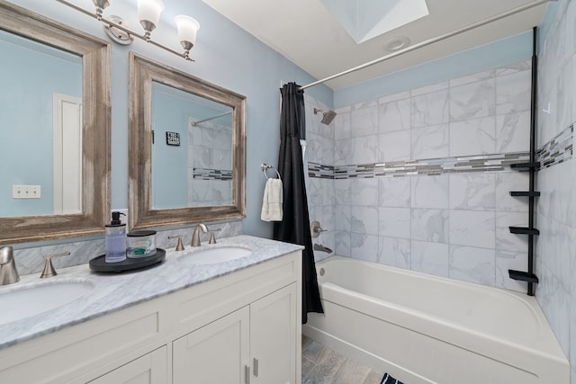 5462 Ridge Xing, Hanover Park, IL 60133 - bathroom with shower / tub combo with curtain, a skylight, and double vanity