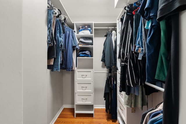 5462 Ridge Xing, Hanover Park, IL 60133 - walk in closet featuring light wood finished floors