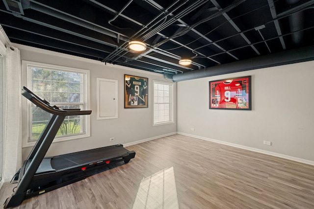 5462 Ridge Xing, Hanover Park, IL 60133 - exercise room featuring wood finished floors and baseboards