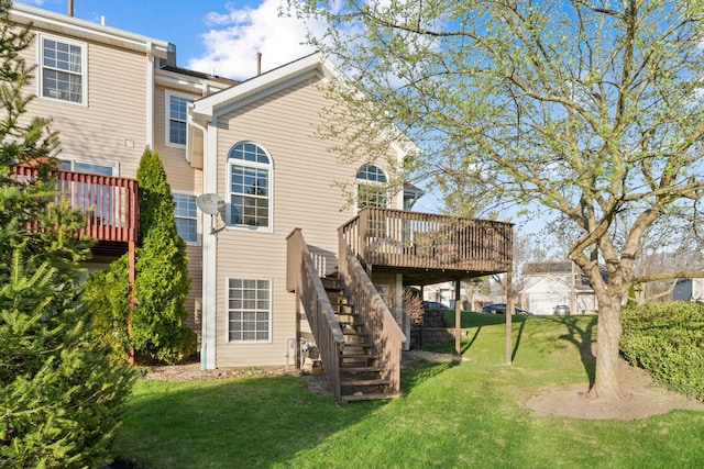 5462 Ridge Xing, Hanover Park, IL 60133 - rear view of property featuring a deck, stairway, and a yard