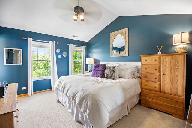 2551 Fallbrook Dr, Hampshire, IL 60140 - carpeted bedroom with vaulted ceiling and ceiling fan