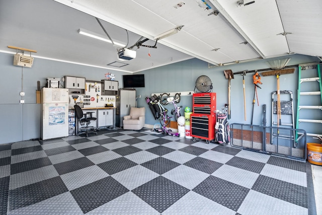 2551 Fallbrook Dr, Hampshire, IL 60140 - garage featuring a garage door opener