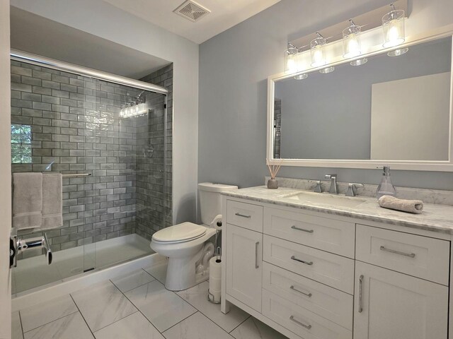 17207 Arrow Head Dr, Lockport, IL 60441 - bathroom with vanity, a shower stall, and marble finish flooring