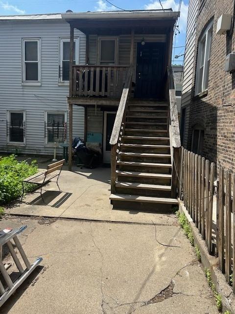 2431 W Thomas St, Chicago, IL 60622 - back of property featuring stairway and a patio area