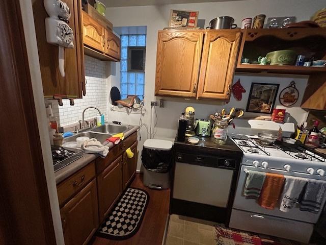 2431 W Thomas St, Chicago, IL 60622 - kitchen featuring white range with gas stovetop and decorative backsplash