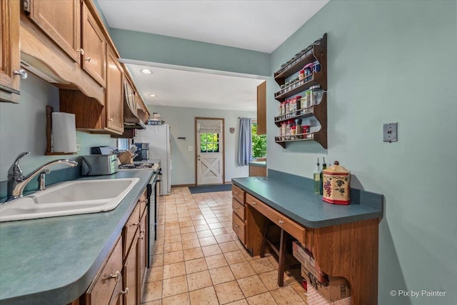 335 Arlington Rd, Itasca, IL 60143 - kitchen with dark countertops, electric stove, open shelves, brown cabinetry, and recessed lighting