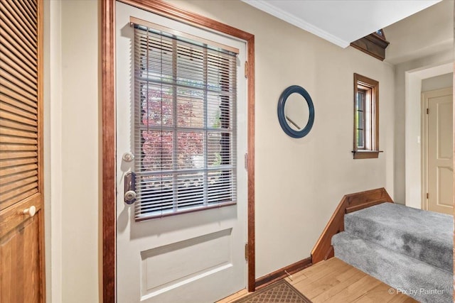 335 Arlington Rd, Itasca, IL 60143 - doorway to outside with baseboards and crown molding