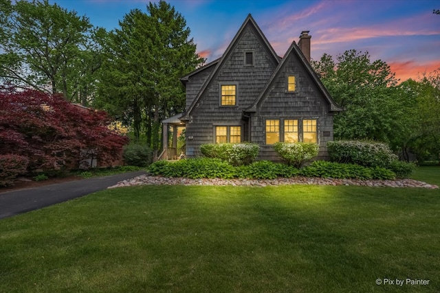 335 Arlington Rd, Itasca, IL 60143 - shingle-style home with a yard and a chimney