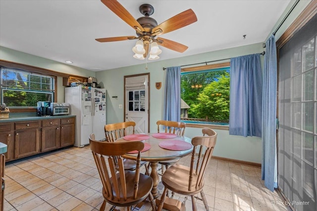 335 Arlington Rd, Itasca, IL 60143 - dining area with healthy amount of natural light and ceiling fan