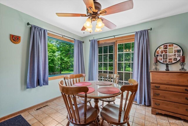 335 Arlington Rd, Itasca, IL 60143 - dining area with baseboards and a ceiling fan