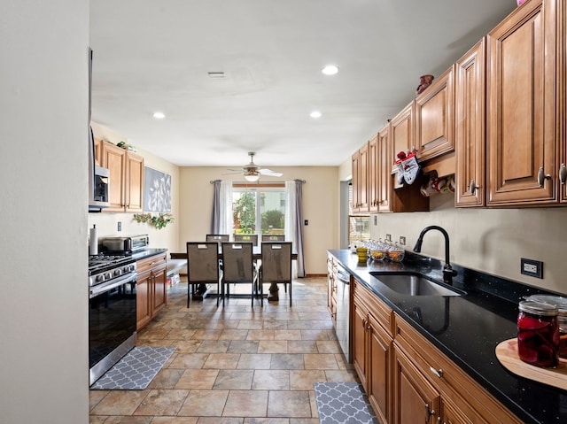 17240 Arrow Head Dr Unit 17240, Lockport, IL 60441 - kitchen with appliances with stainless steel finishes, stone finish floors, ceiling fan, recessed lighting, and brown cabinets
