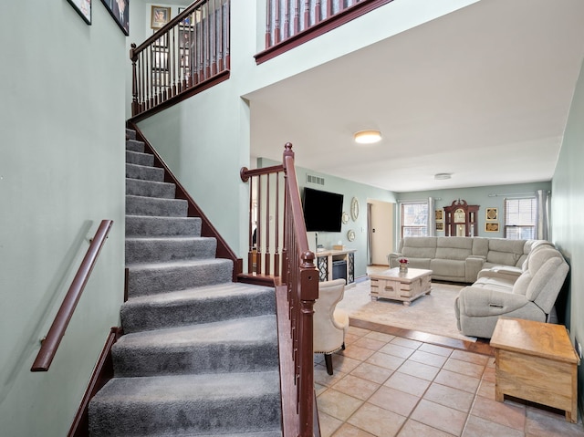 17240 Arrow Head Dr Unit 17240, Lockport, IL 60441 - living room with stairs and tile patterned floors