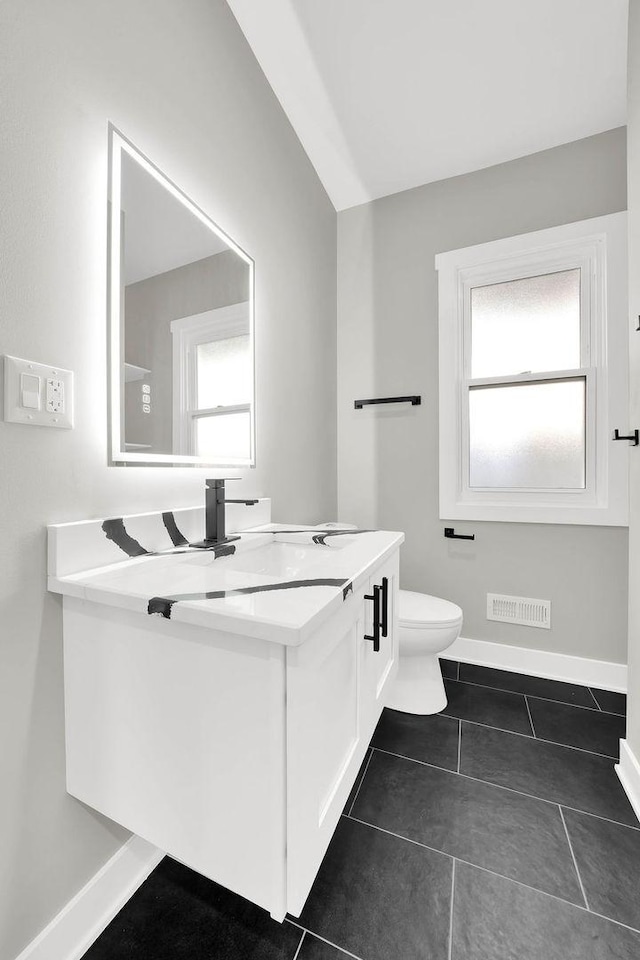 5414 W Haddon Ave, Chicago, IL 60651 - bathroom featuring vanity and tile patterned flooring