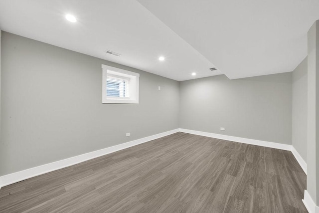 5414 W Haddon Ave, Chicago, IL 60651 - empty room with dark wood-style flooring and recessed lighting