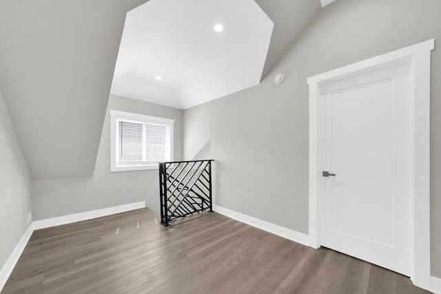 5414 W Haddon Ave, Chicago, IL 60651 - bonus room with vaulted ceiling, wood finished floors, and recessed lighting