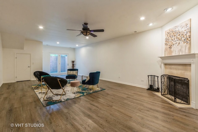 1302 N Bosworth Ave Unit 1, Chicago, IL 60642 - living area with wood finished floors, ceiling fan, recessed lighting, and a tiled fireplace