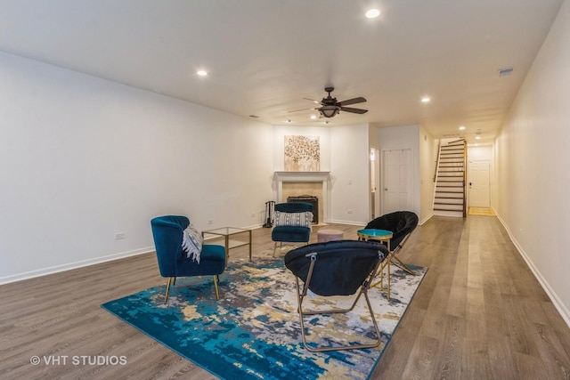 1302 N Bosworth Ave Unit 1, Chicago, IL 60642 - living area featuring recessed lighting, stairs, ceiling fan, wood finished floors, and a fireplace