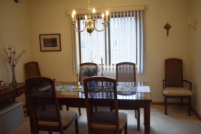 13058 Laurel Glen Ct Unit 203, Palos Heights, IL 60463 - carpeted dining area with a chandelier and baseboards